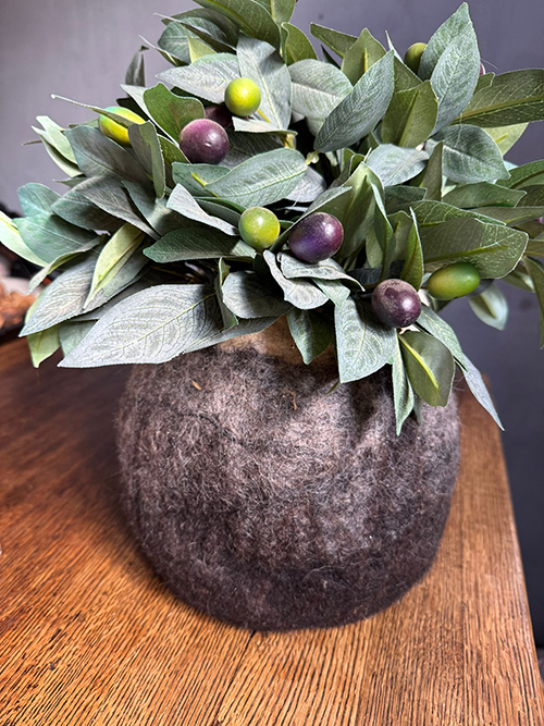 Gevilte vaascover in natureltinten